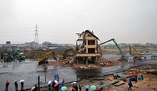 Китайский дом посреди дороги был снесен